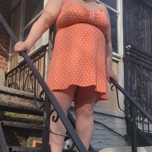 A lovely summer orange dress with white polka dot.